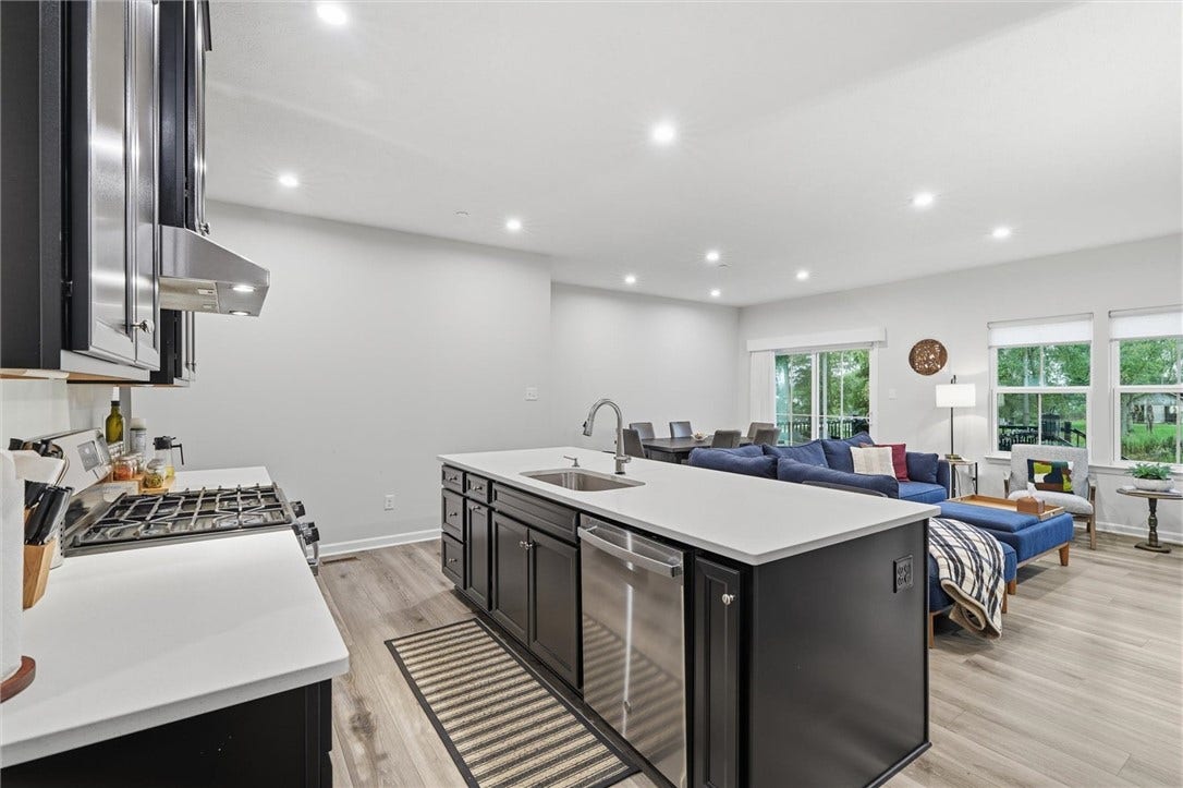GE Gas stove with self cleaning oven and SS Range Hood.