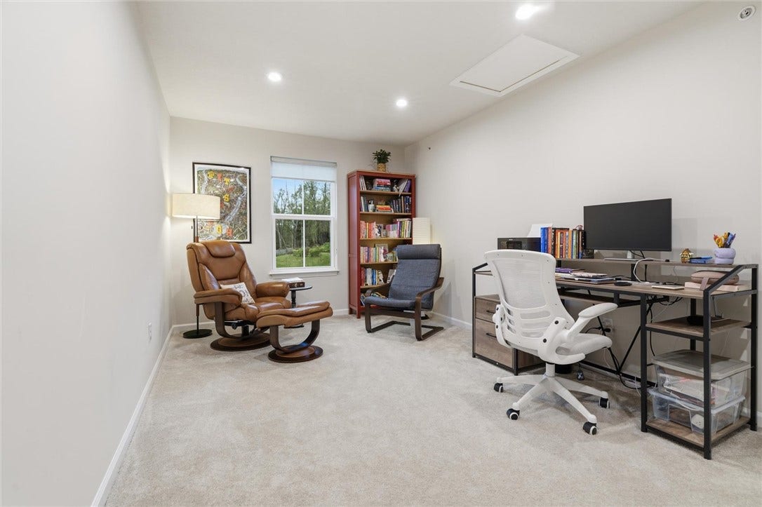 The 16'10' loft/den off the primary bedroom provides a versatile bonus space, ideal for work, relaxation, or storage, and includes convenient attic access.