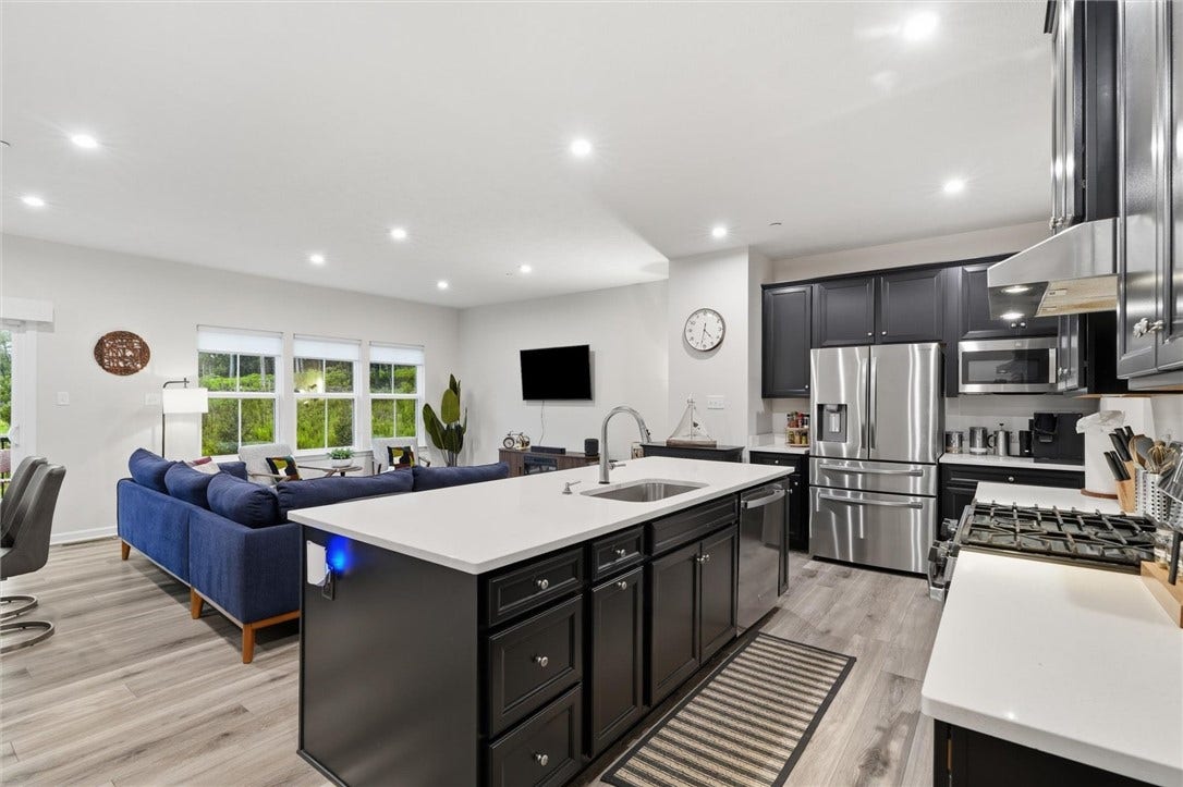 Main level open concept Kitchen, Living and Dining room, perfect space for entertaining and family gatherings.