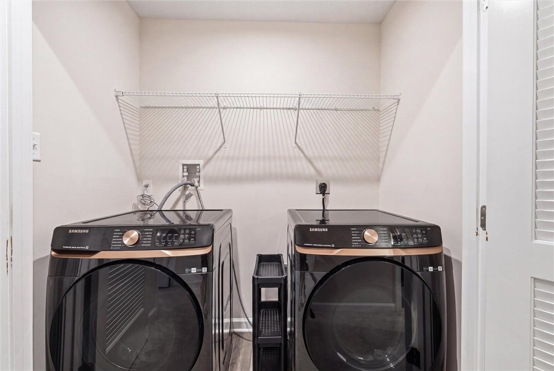 6'x4' Laundry area on upper level with Samsung Super Speed Smart Things Washer and Steam moisture, Multi- Sensor Smart Things Electric Dryer.