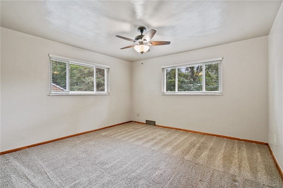 The primary bedroom is in the back of the house