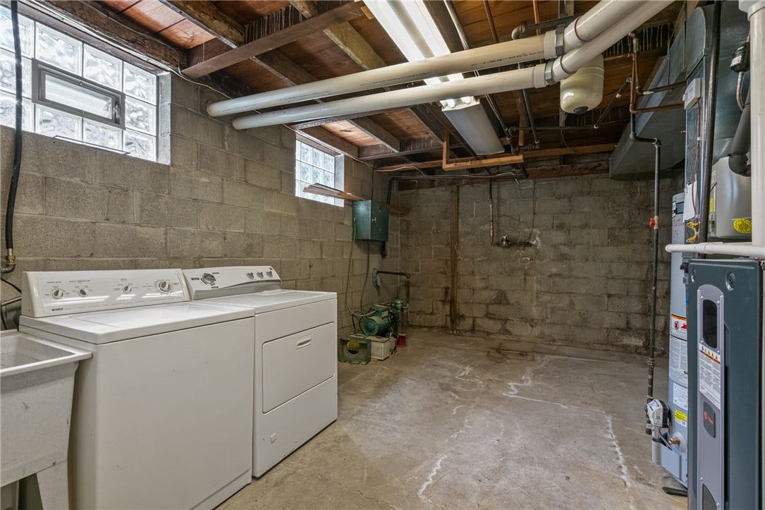 the laundry and mechanical area of the basement
