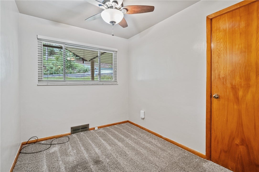The third bedroom across the hall from the bathroom