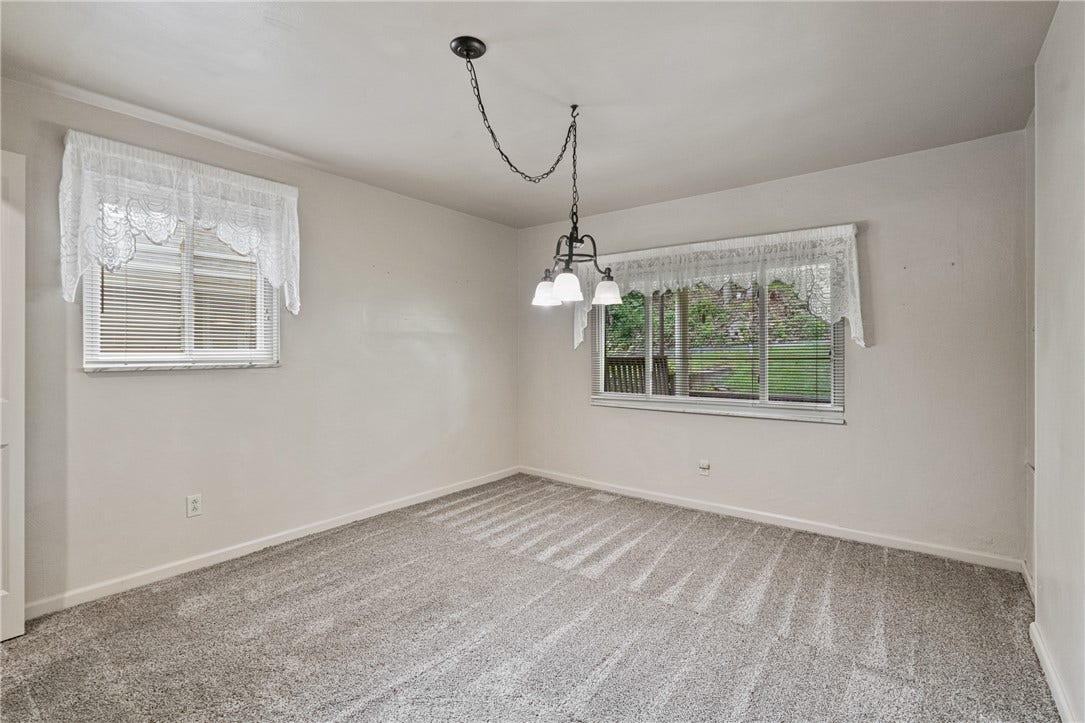 The room directly connected to the kitchen was used as a formal dining room