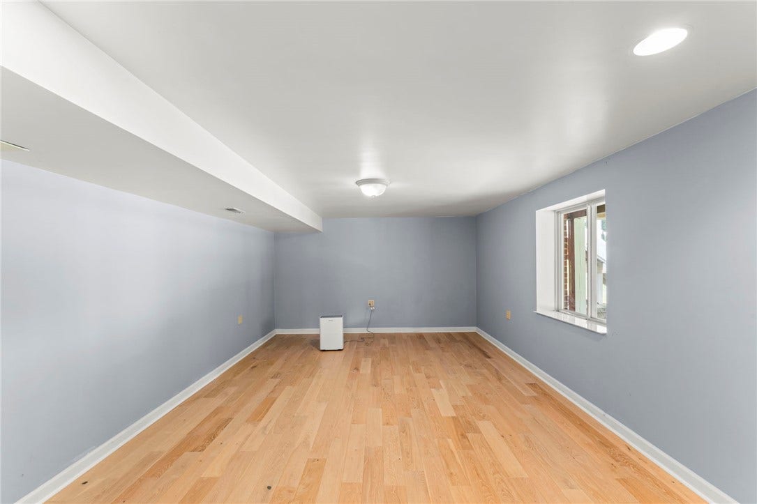 A versatile bonus room ideal for a home theater, media room, fitness room, or hobby space.