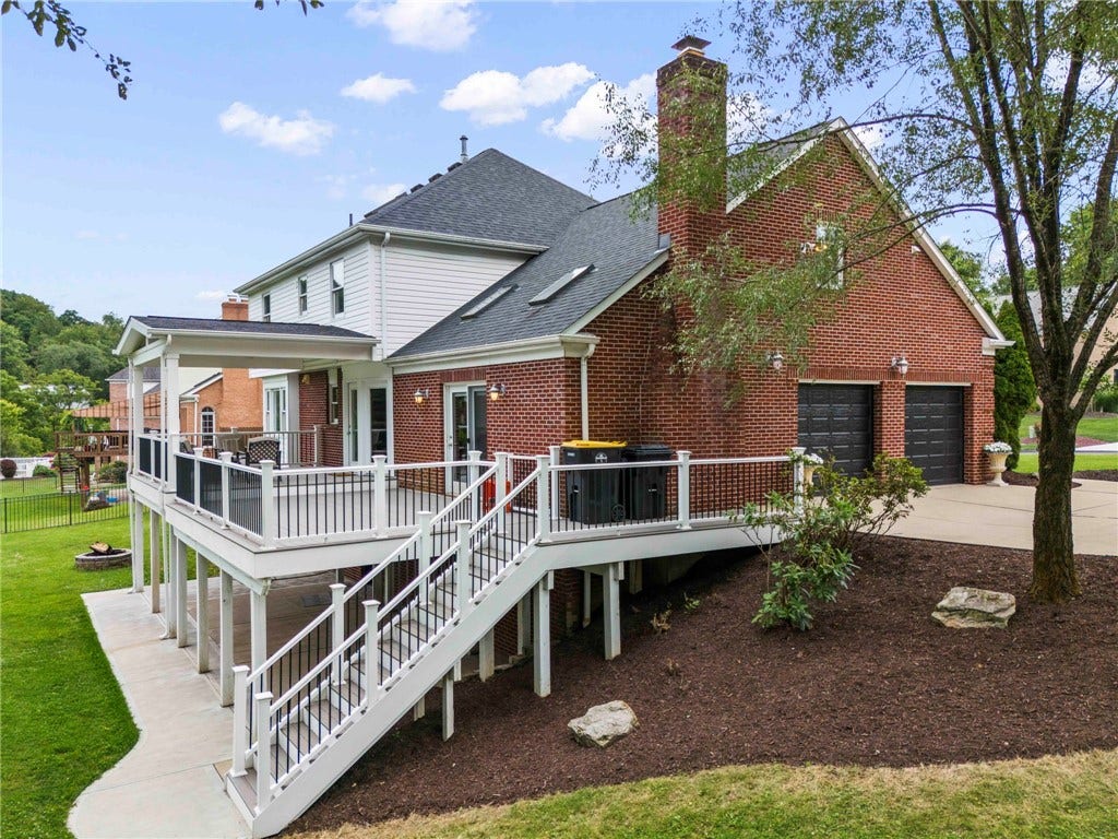Picture depicts the rear and side of property.