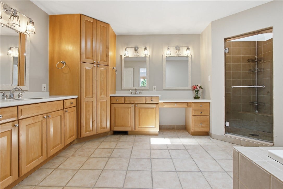 2072 Outlook Drive, Pittsburgh, PA 15241 The spa-inspired ensuite features dual vanities, a soaking tub, and an oversized walk-in shower for everyday luxury.
