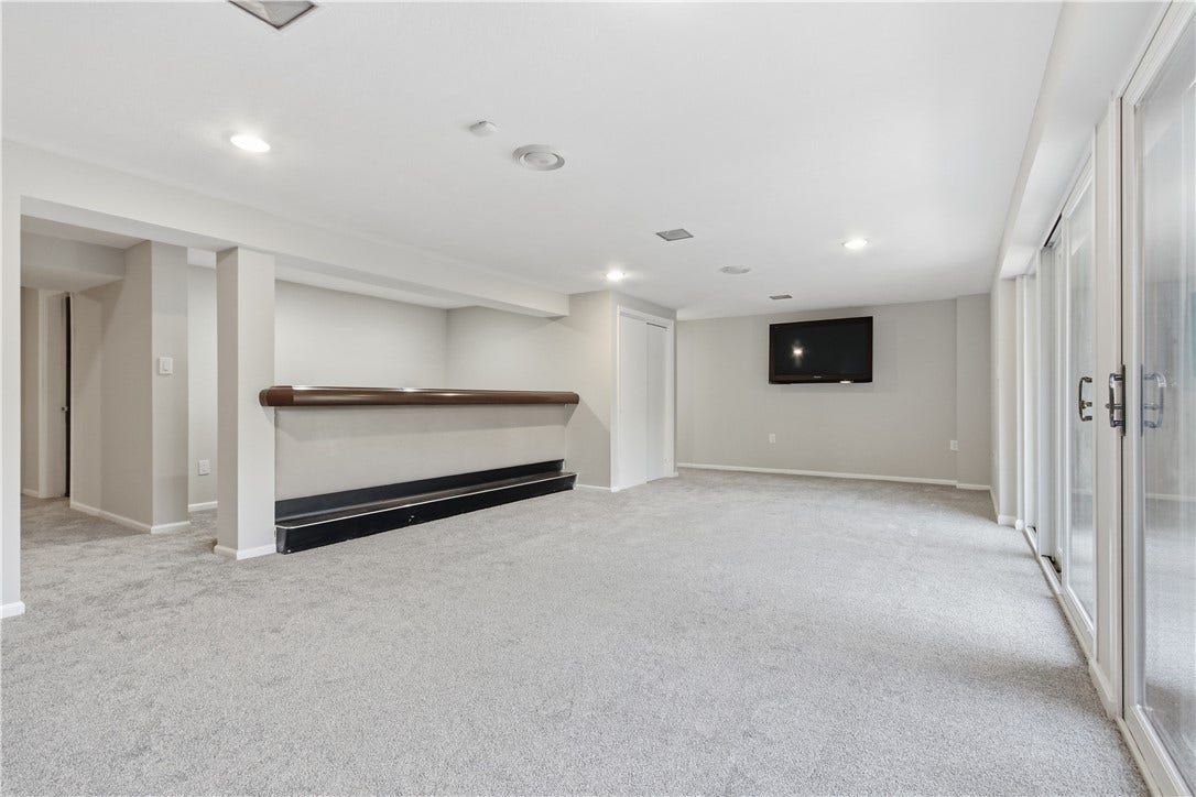 2072 Outlook Drive, Pittsburgh, PA 15241 Walls of glass invite natural light while providing seamless access to the patio and backyard.