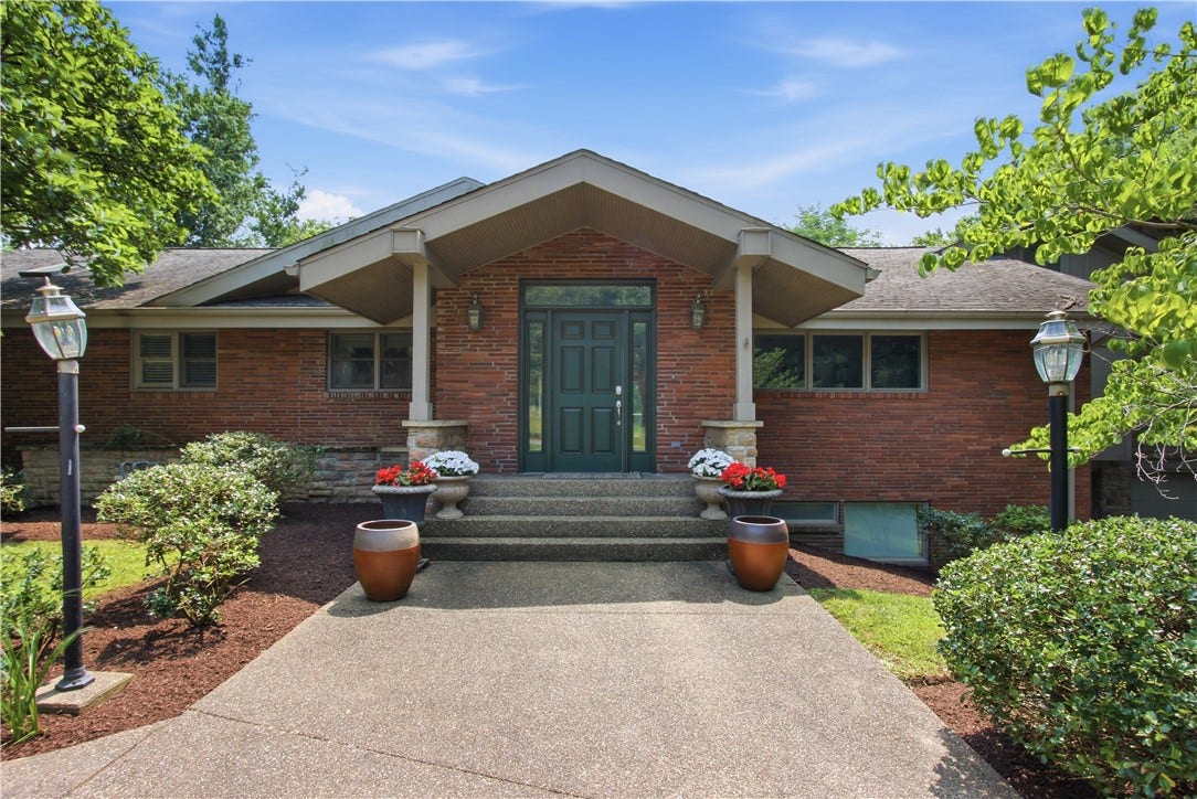2072 Outlook Drive, Pittsburgh, PA 15241 A welcoming entrance framed by professional landscaping creates an unforgettable first impression.