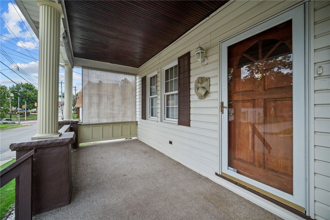 169 Allegheny Ave, Pittsburgh, PA 15202 Spacious 18x7 front porch with 9' ceilings and privacy awnings!