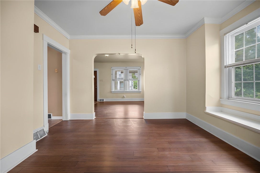 169 Allegheny Ave, Pittsburgh, PA 15202 Dining Room with Bamboo hardwood floor, window seat and ceiling fan/light. Opens to Living Room and also Kitchen.