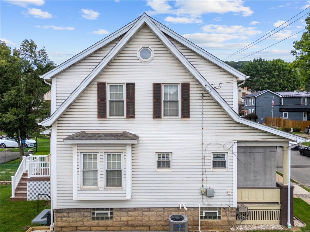 169 Allegheny Ave, Pittsburgh, PA 15202 Covered front porch and open back deck with steps to yard.
