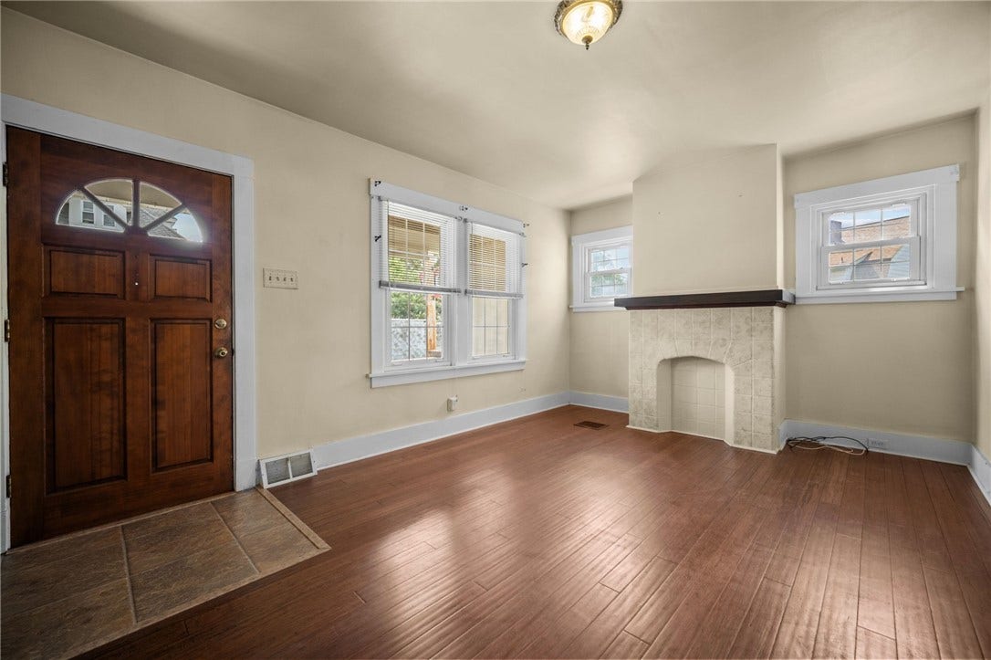 169 Allegheny Ave, Pittsburgh, PA 15202 Living Room with Bamboo hardwood floor and decorative fire place.