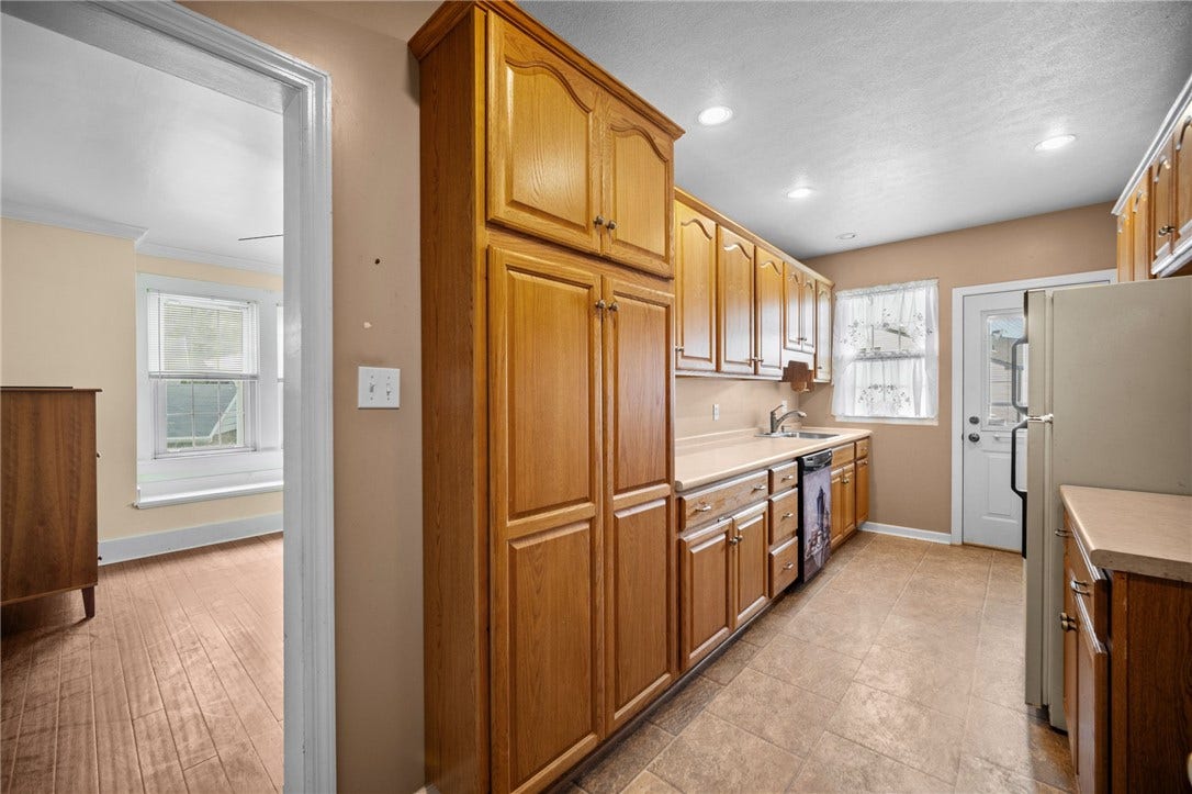 169 Allegheny Ave, Pittsburgh, PA 15202 Oak cabinets and large pantry in Kitchen. So much room for storage!