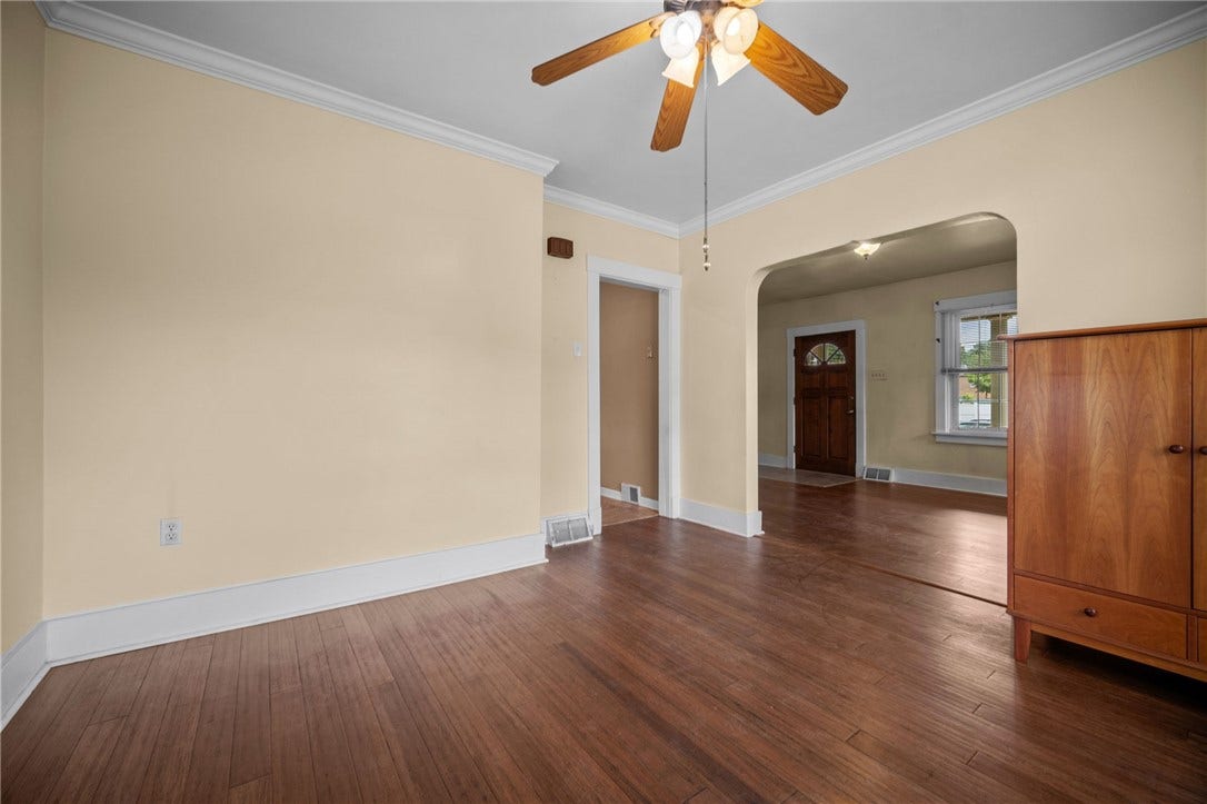 169 Allegheny Ave, Pittsburgh, PA 15202 Dining Room with Bamboo hardwood floor, window seat and ceiling fan/light. Opens to Living Room and also Kitchen.