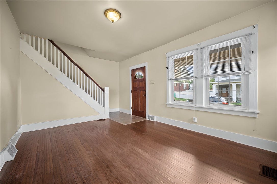 169 Allegheny Ave, Pittsburgh, PA 15202 Living Room with Bamboo hardwood floor and decorative fire place.