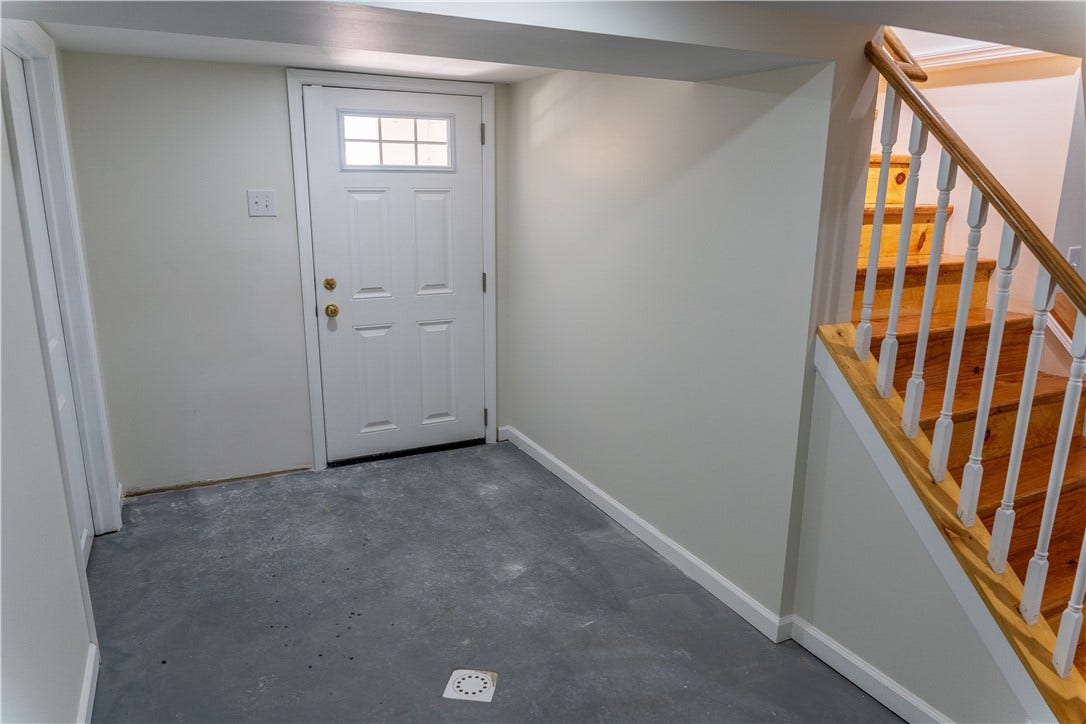 Finished basement with durable painted floors