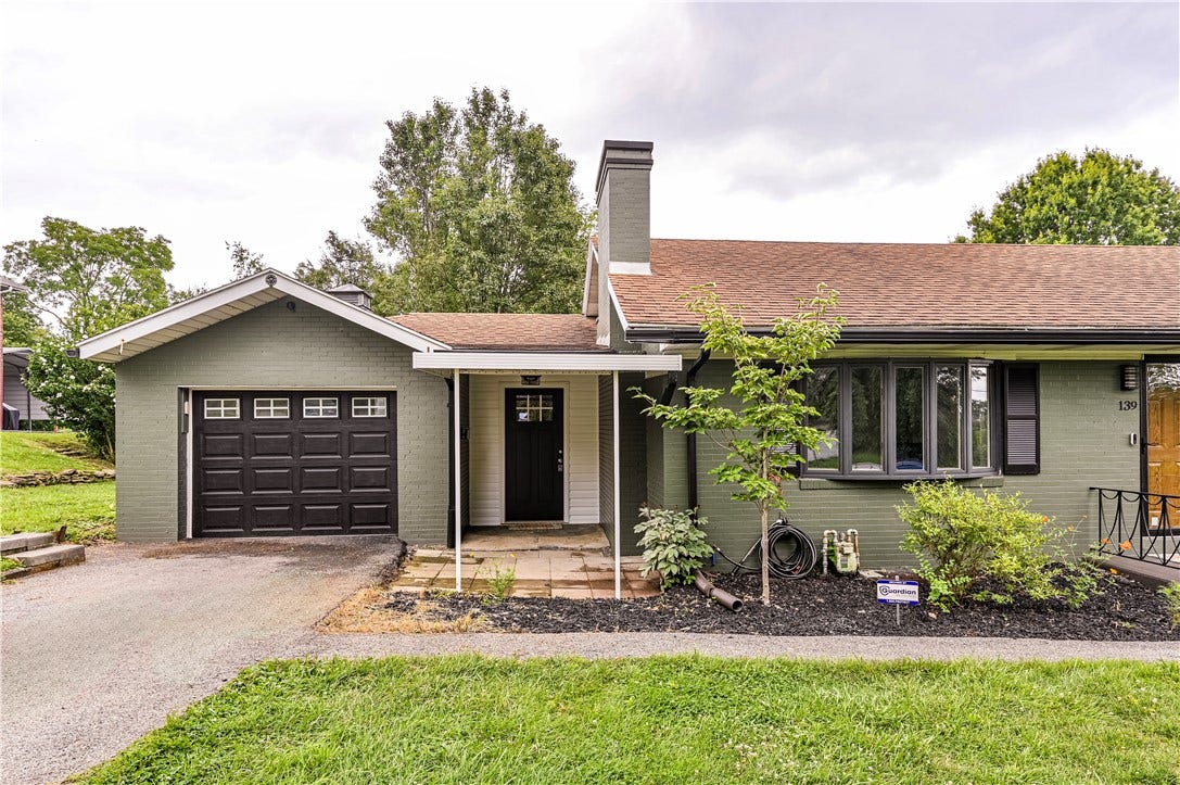 The first entrance leads into the laundry/mud room conveniently located between the garage and kitchen area.