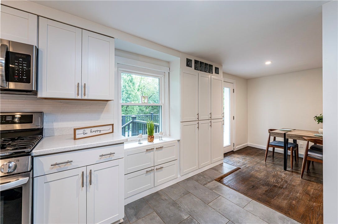 You'll definitely "BE HAPPY" with this awesome kitchen!