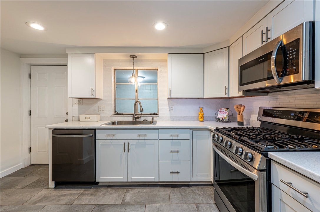 Love this updated kitchen that is practical and stunning!