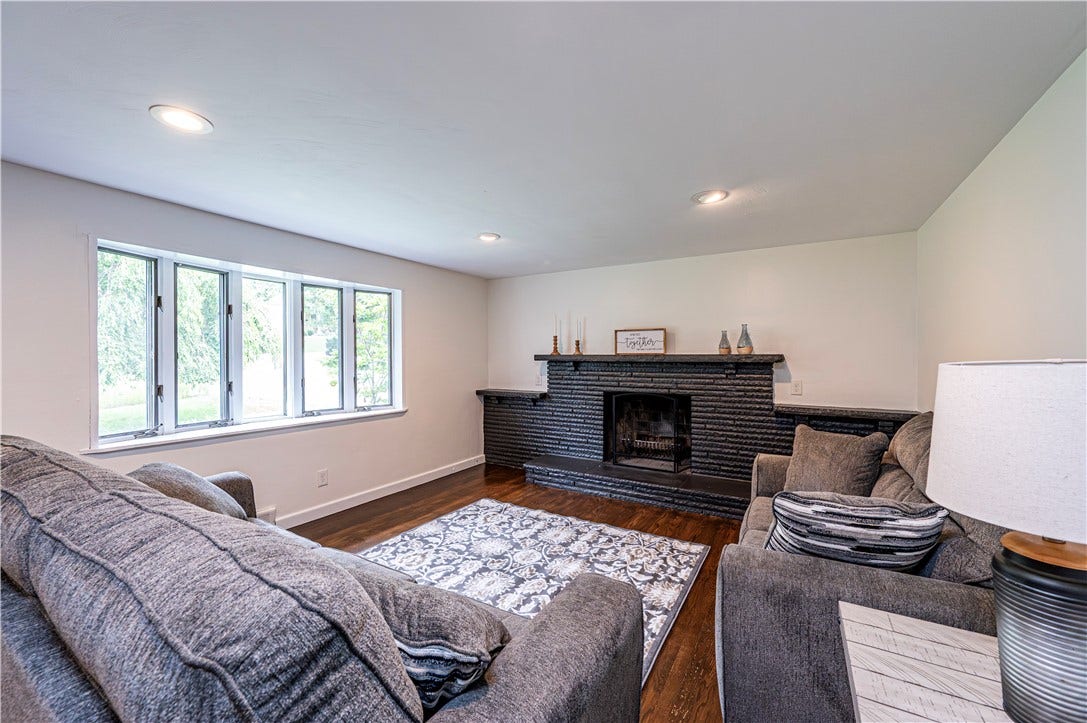 The spacious living room is great for entertaining family and friends.
