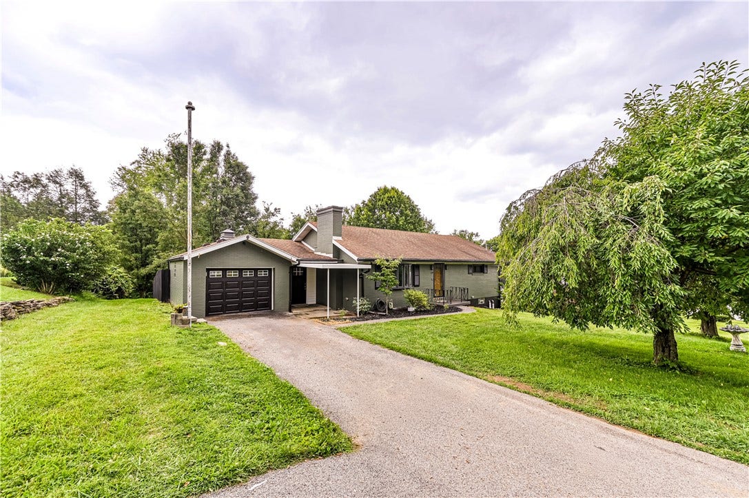 Welcome to 139 Maus Drive a charming updated home with great CURB APPEAL and an awesome tree bordered  partilly fenced back yard.
