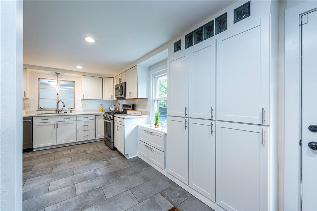 SO MANY PANTRIES FOR ALL OF THOSE KITCHEN ACCESSORIES THAT YOU NEVER HAVE ROOM FOR!!! CAN YOU SAY ROASTER!