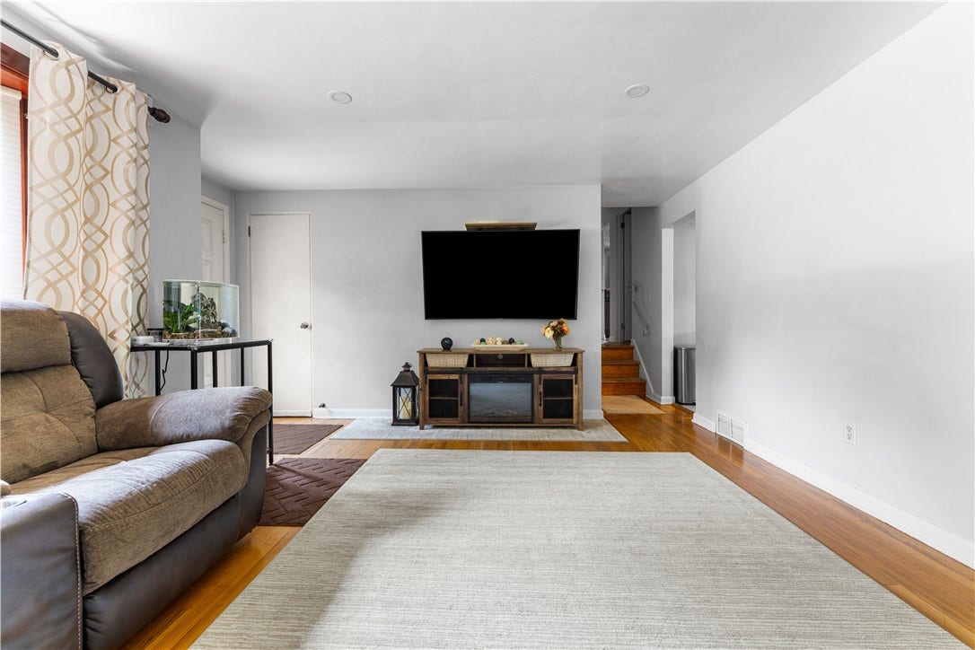 Entrance featuring a convenient coat closet.