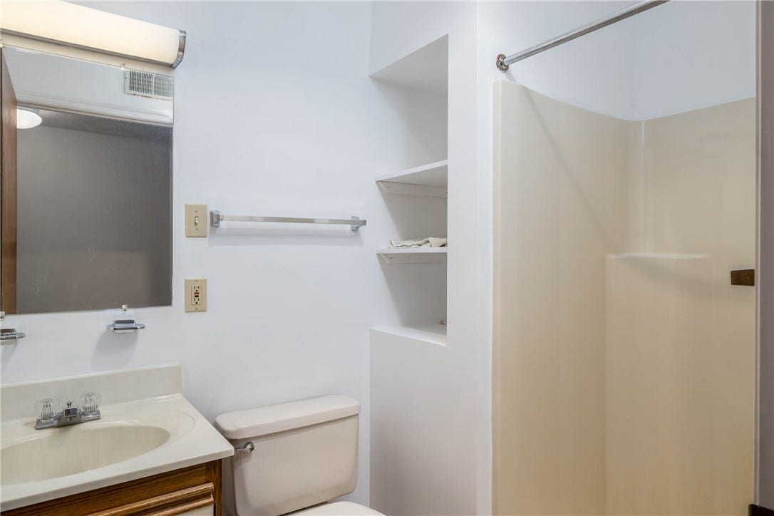 Full bath with walk in shower.