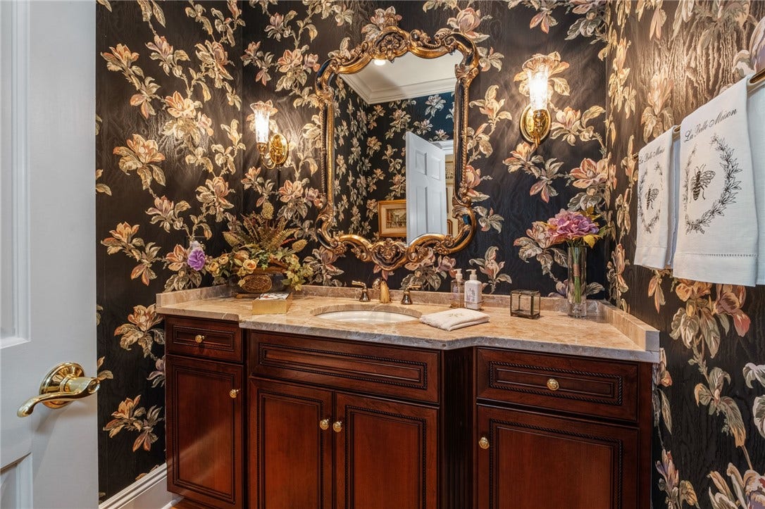 This powder room, located on the first floor, is one of two on the main living level.