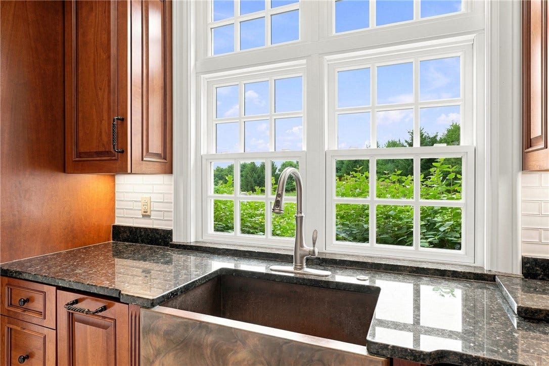 Doing the dishes won't seem like quite the chore as you enjoy the stunning view of the land that comes with this property.