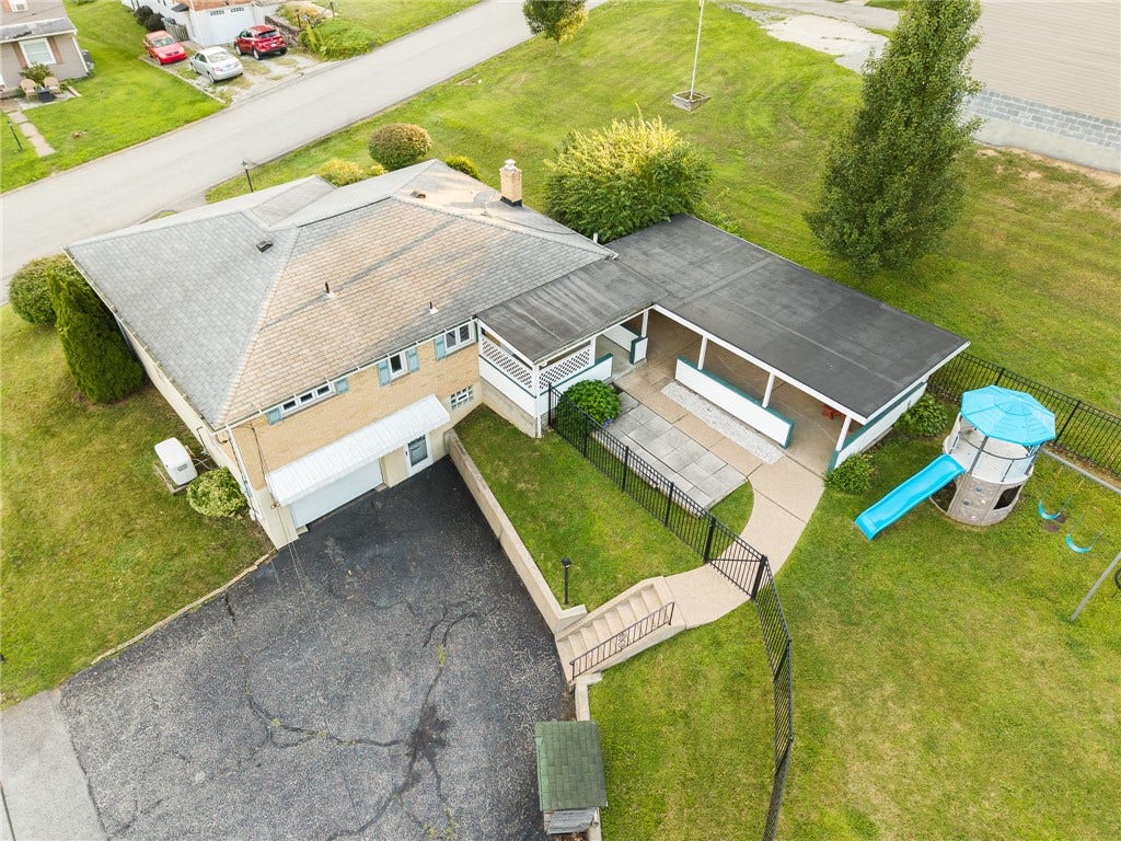 Wonderful large fenced in back yard on a corner lot! You'll love the 6' fence!