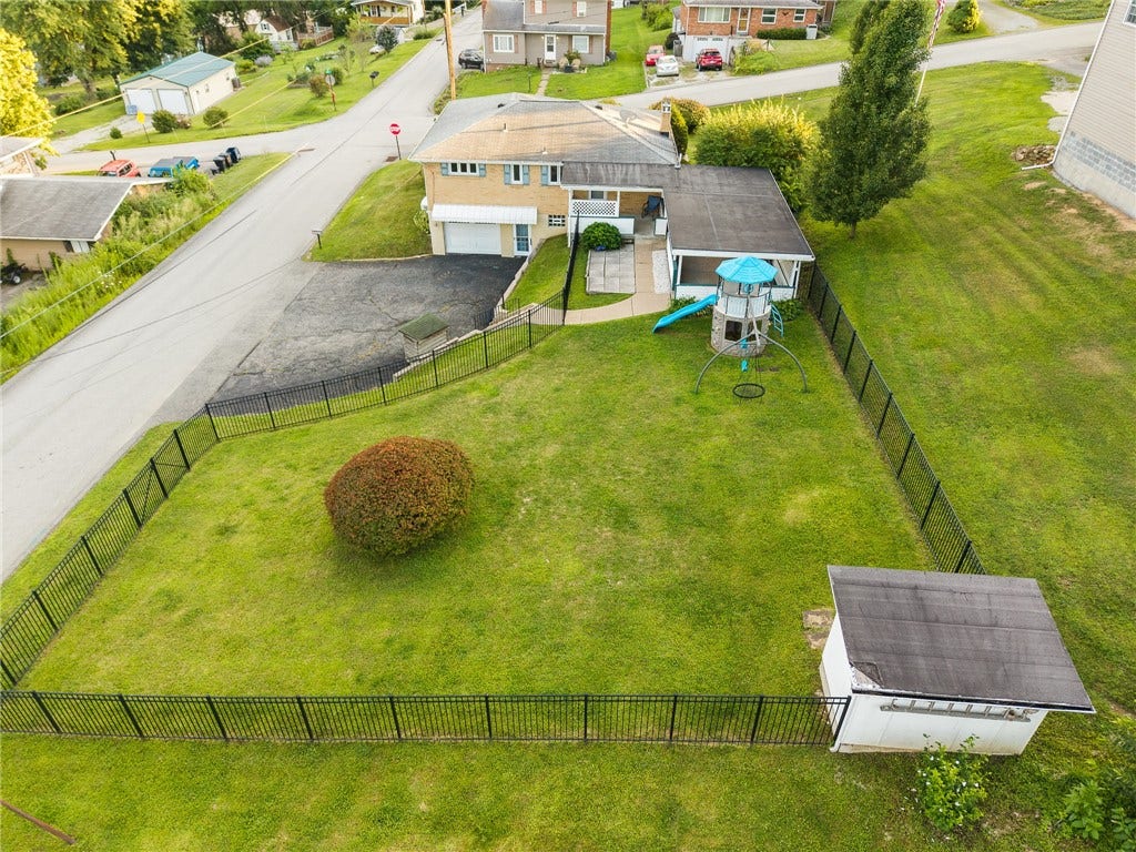 Wonderful large fenced in back yard on a corner lot! You'll love the 6' fence!