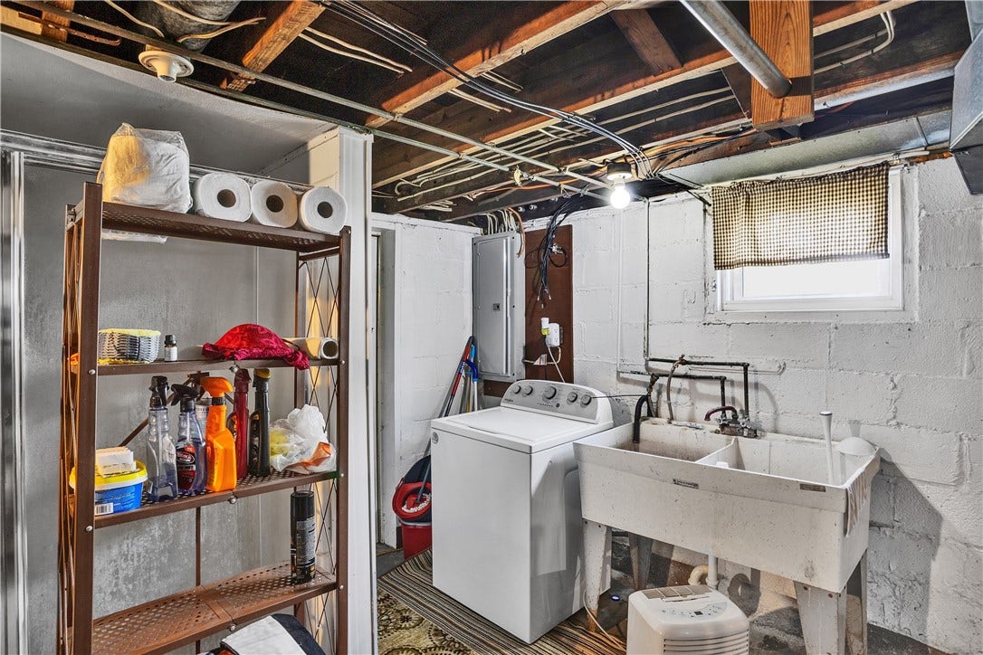 Basement with utility sink and hook ups.  Tenants washer/dryer. "Pittsburgh" shower has not been used. As-is