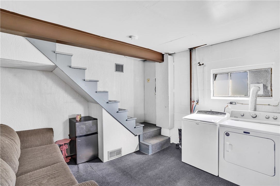 Walk into the lower level laundry area. Washer/Dryer not included.