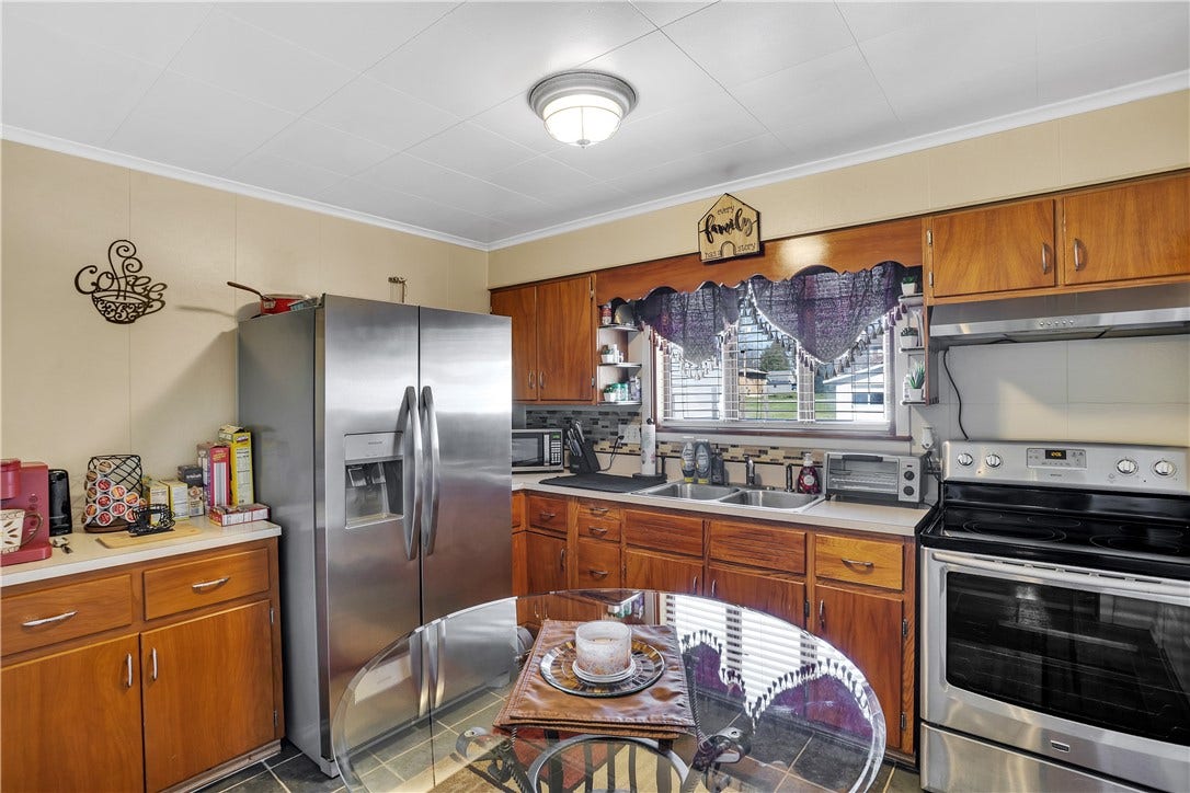 Eat in Kitchen! Included are Electric Stove and Refrigerator