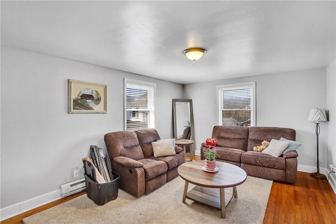 Nice size living room with original wood floors