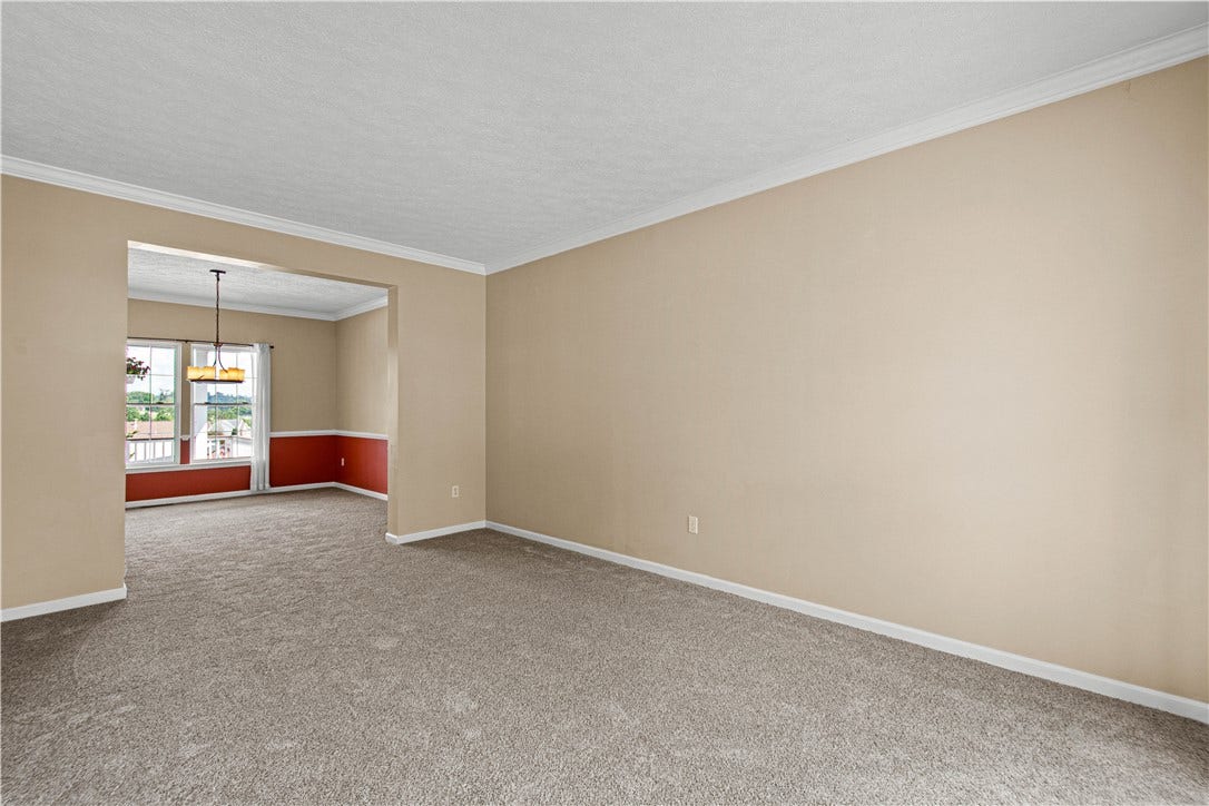 living room opens to dining room