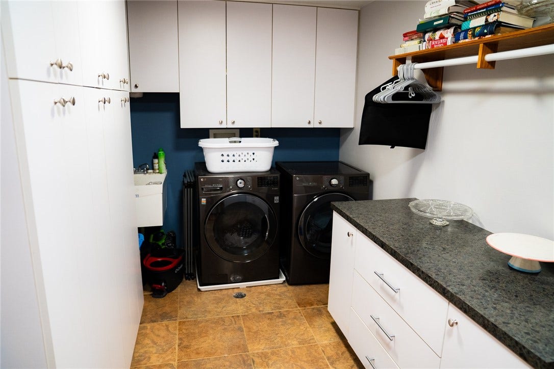 Laundry behind kitchen, main floor