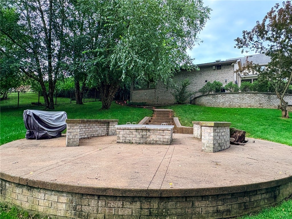 Fire Pit looking toward the pool house (lighted stairs)