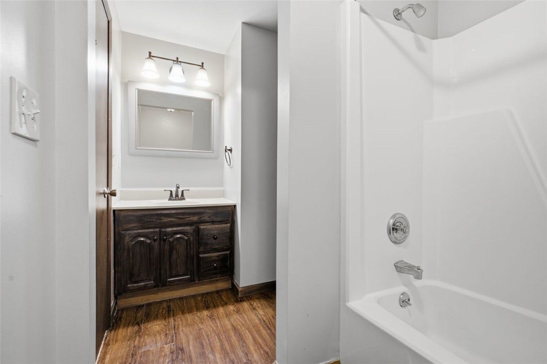 full bath upstairs with direct access from primary bedroom