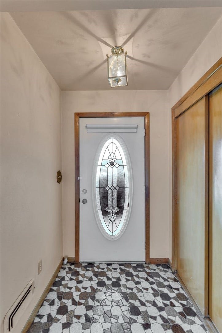 Entry with a Double Closet!