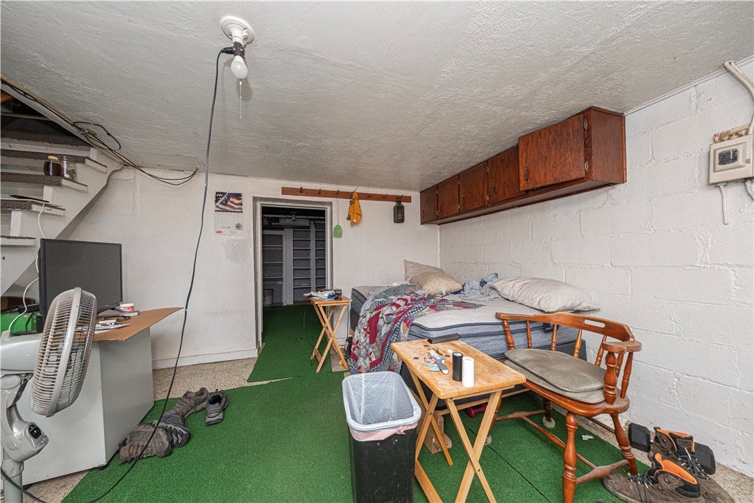 This area of the basement can be used for games or storage.