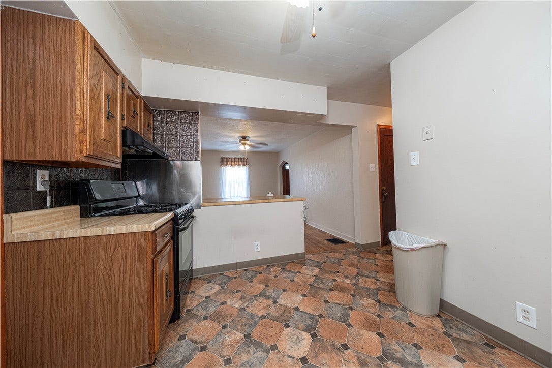 The Kitchen is  11'6" x 9'3"