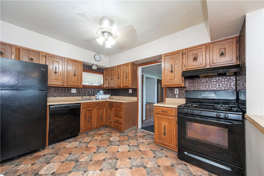 Another view of the kitchen, looking into the family room.