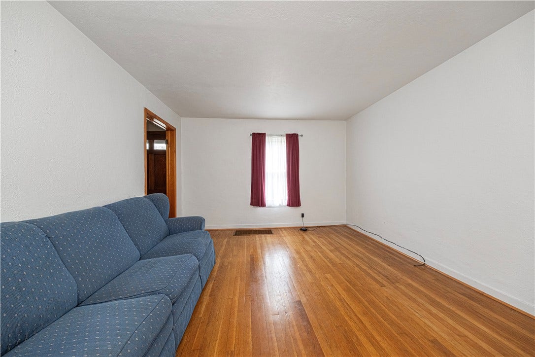 The living room is 15'x11'10".