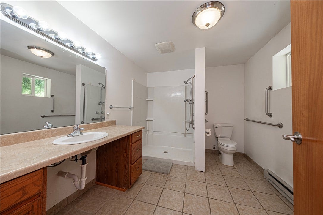 This handicapped-bathroom is located in the multi-purpose room.