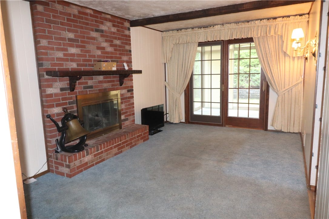 Family room out to the sunroom.