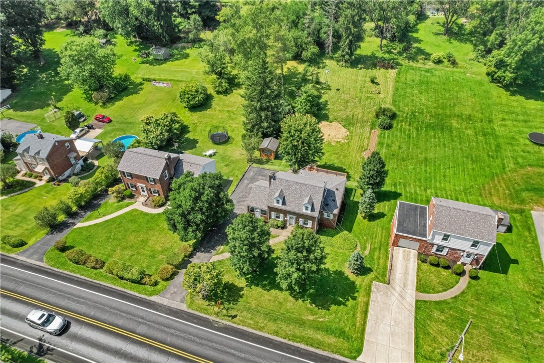 The 1/2 acre lot contains 2 sheds and room for fire pit, swimming pool, gardens or whatever sport you want to play!
