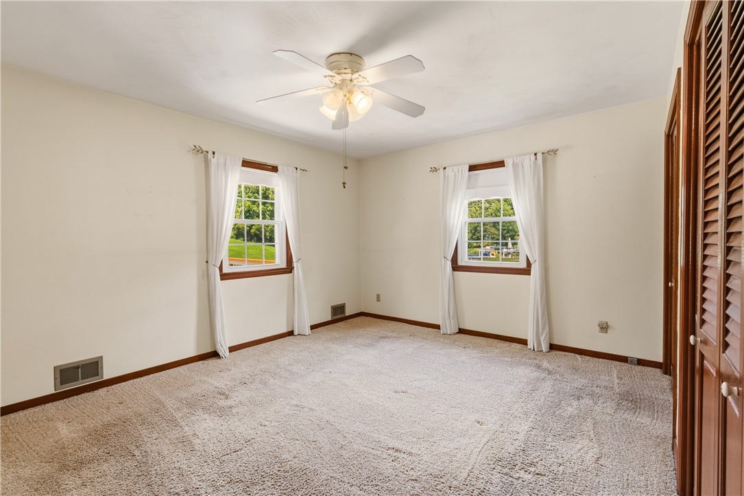 Spacious and convenient with hardwood floors under the carpet.